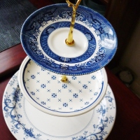 High tea style cake stands, anyone for crust less cucumber sammies, or scones with cream and jam?